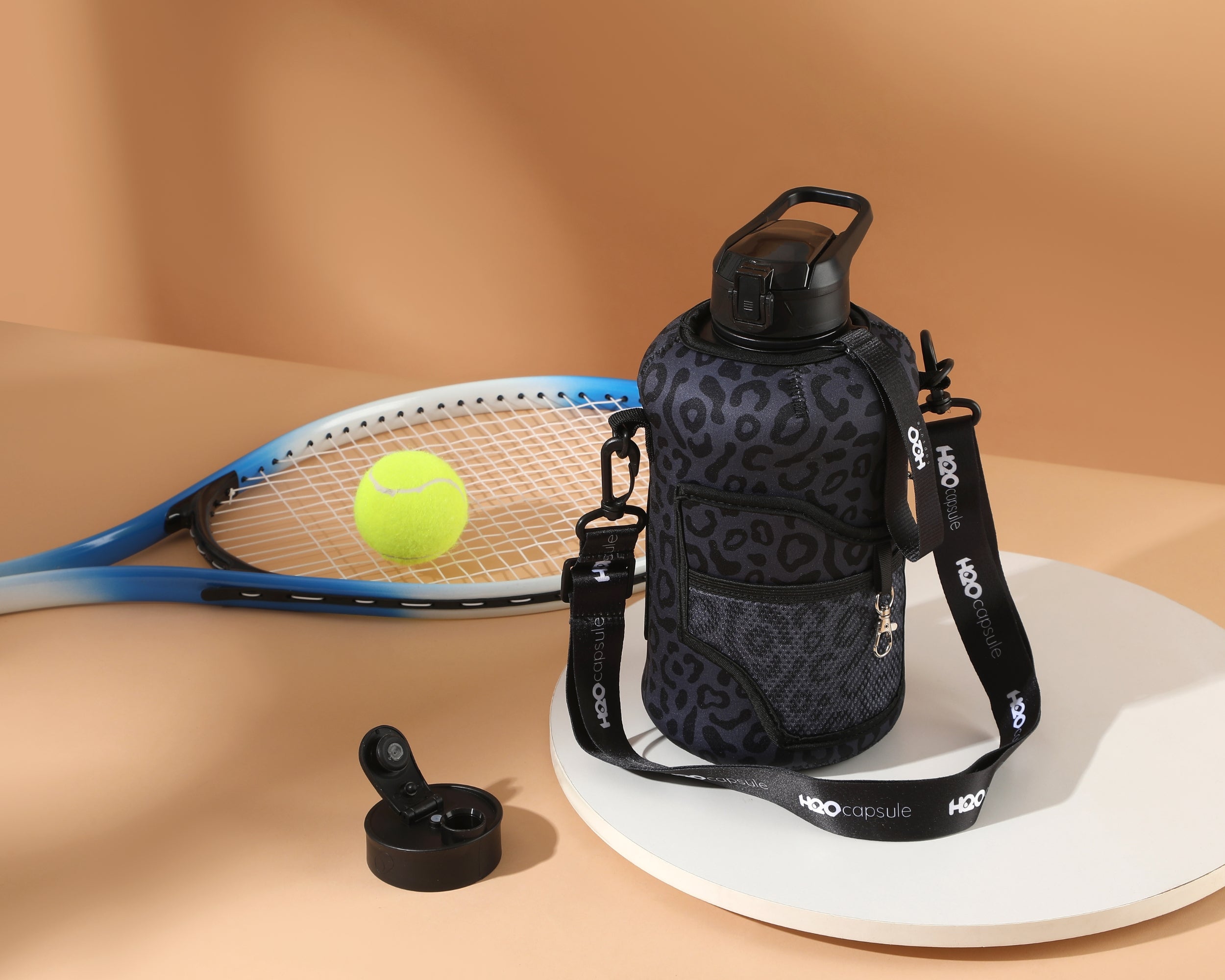 Black leopard - Carry-all- Half Gallon Water Bottle with Storage Sleeve and Covered Straw Lid