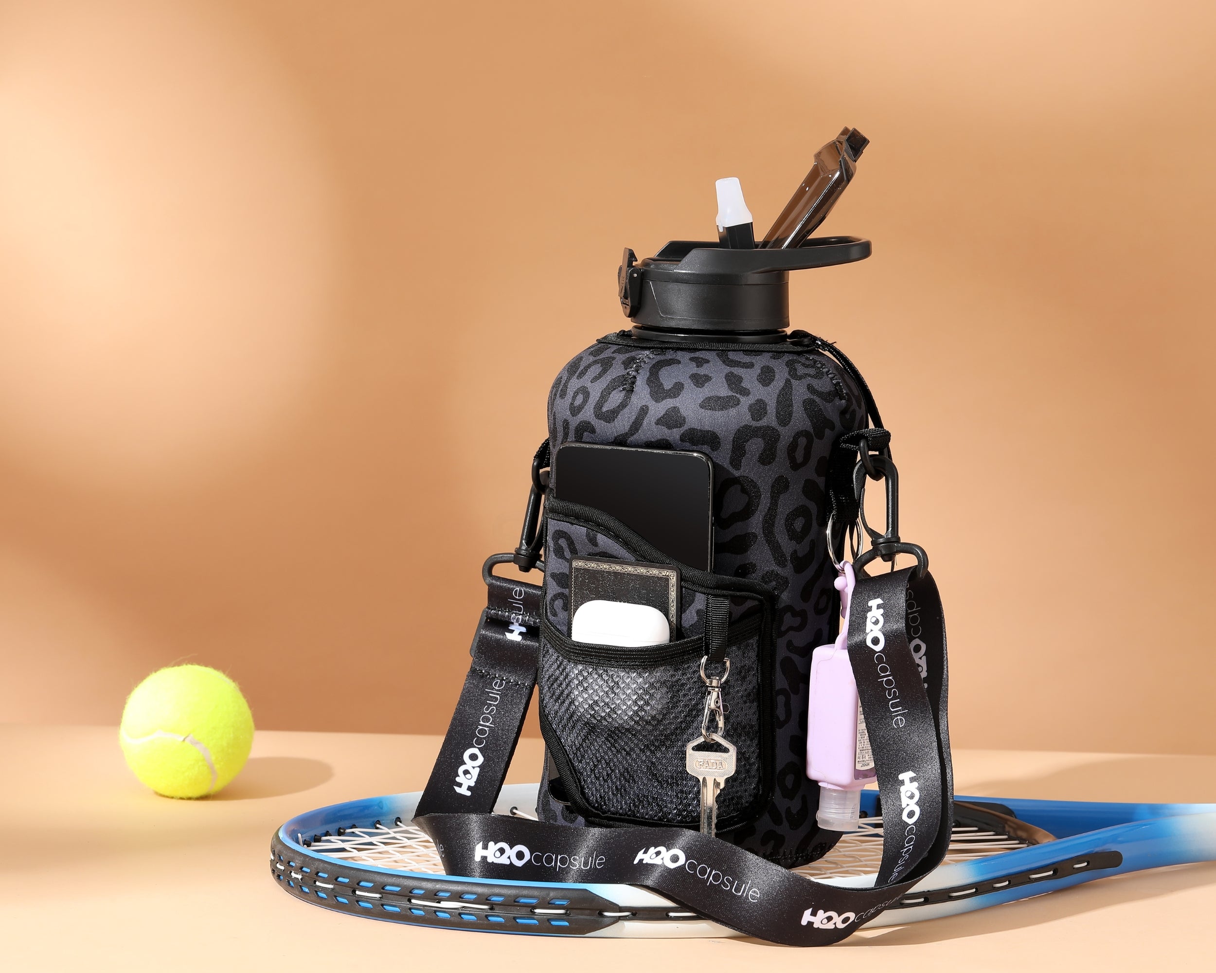 Black leopard - Carry-all- Half Gallon Water Bottle with Storage Sleeve and Covered Straw Lid