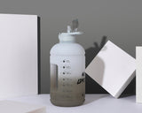 Rocky shore-H2O Capsule INSPO 1 Gallon Water Bottle with Time Marker and Straw