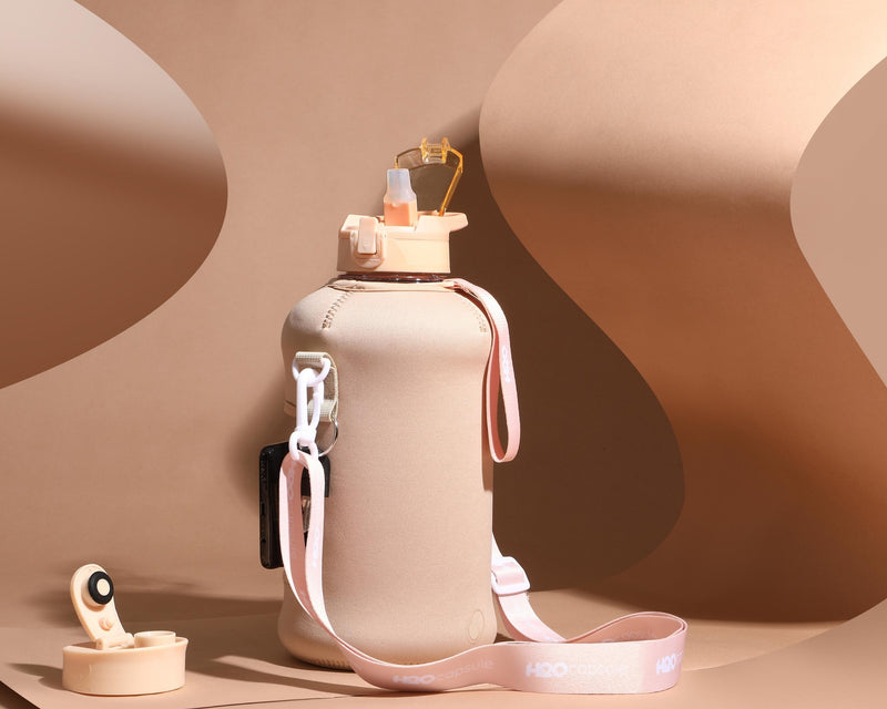 Sandy Beige- Classic -H2O Capsule 2.2L Half Gallon Water Bottle with Storage Sleeve and straw lid