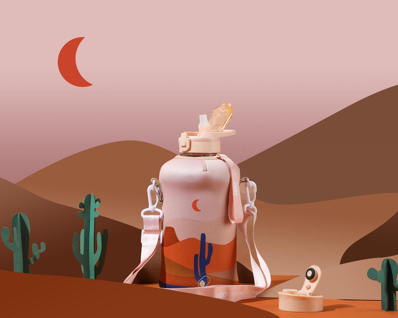 Desert Night - Classic -H2O Capsule 2.2L Half Gallon Water Bottle with Storage Sleeve and straw lid