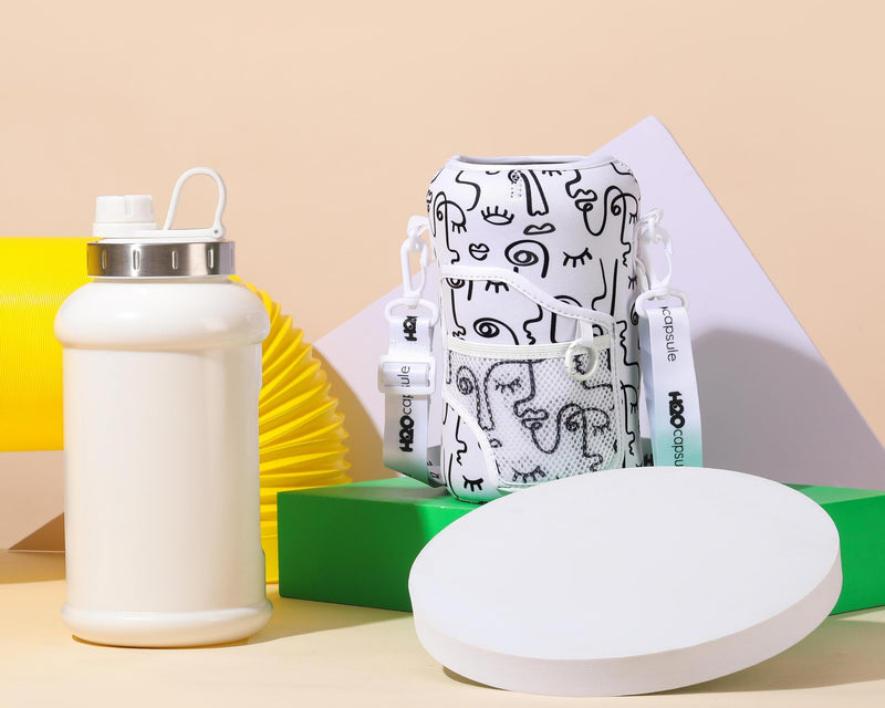 Faces - Wide Mouth carry-all - Half Gallon Water Bottle with Storage Sleeve and removable straw